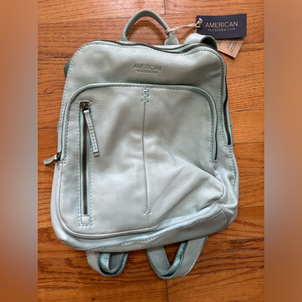 Mint green leather backpack purse, perfect for Spring!